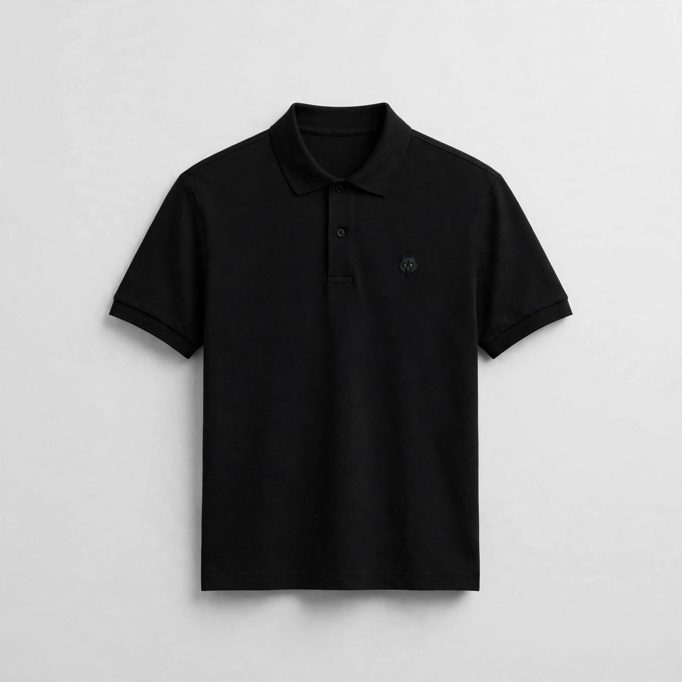 The Black Polo — black polo shirt with the embroidered wolf emblem on the chest